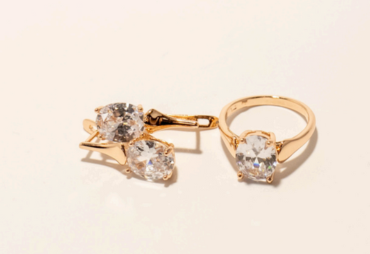 Juegos aritos mas anillo piedra blanca